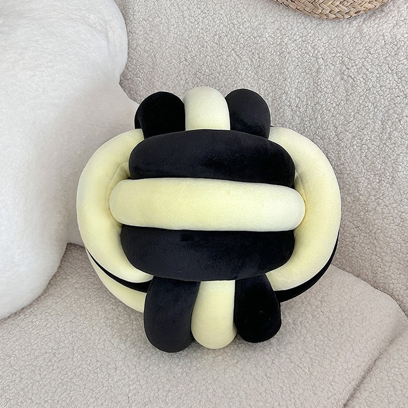 A braided ball pillow