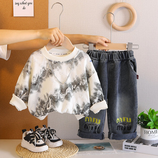 A children's sweater jeans set