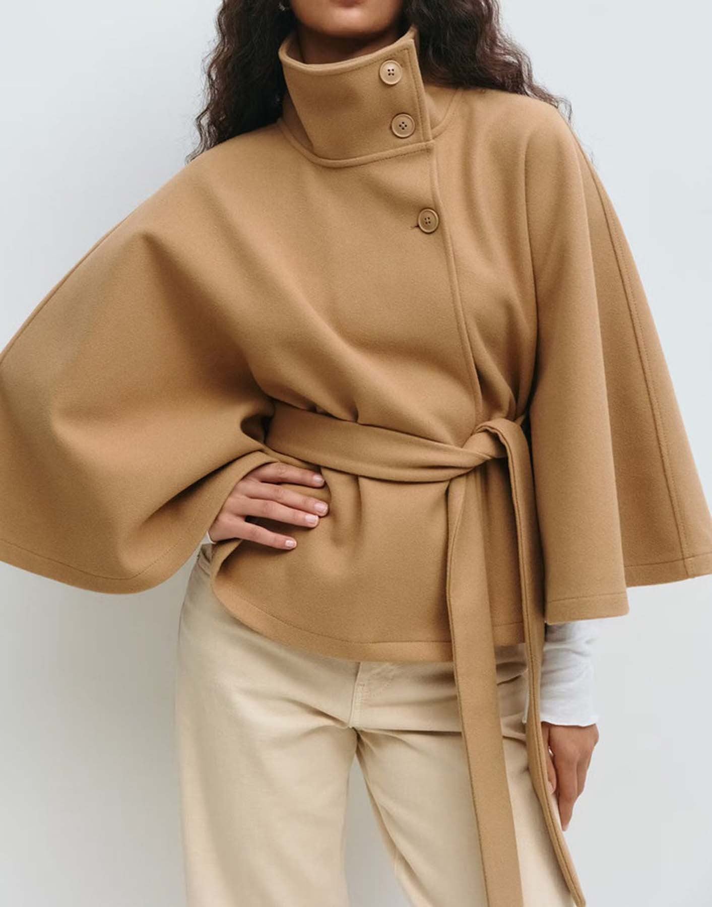 A cape stand-up collar button-down belt coat