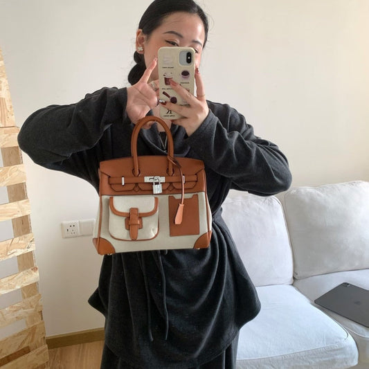 A spring new contrasting color canvas leather pocket platinum bag versatile casual shoulder oblique span women's bag