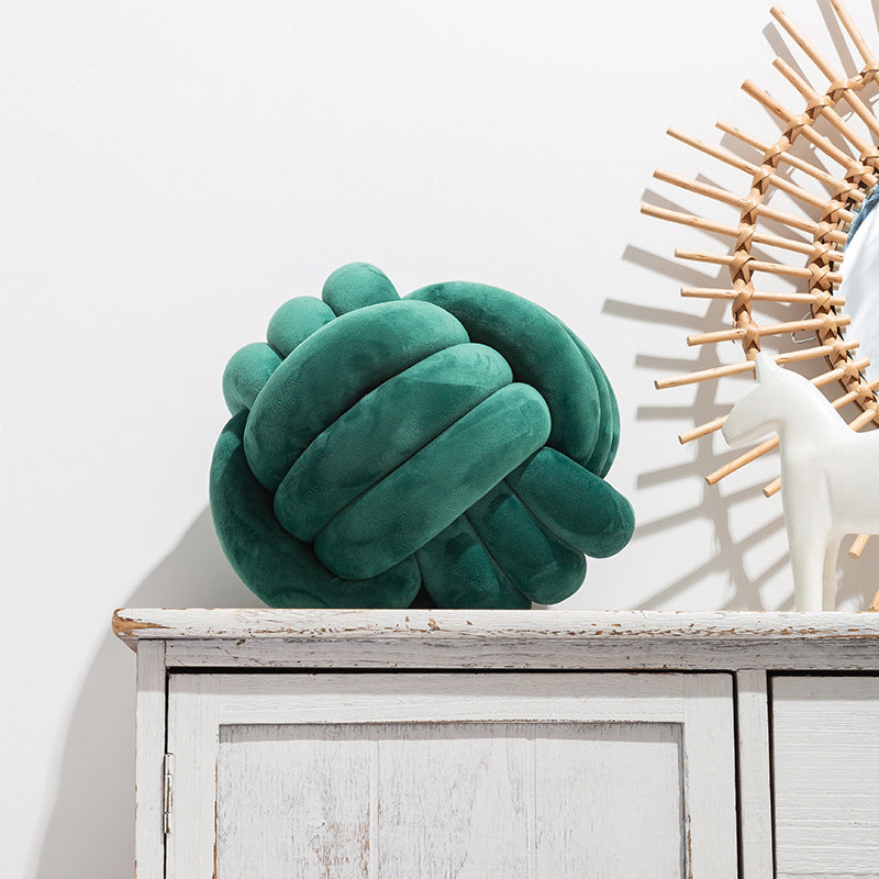 A braided ball pillow