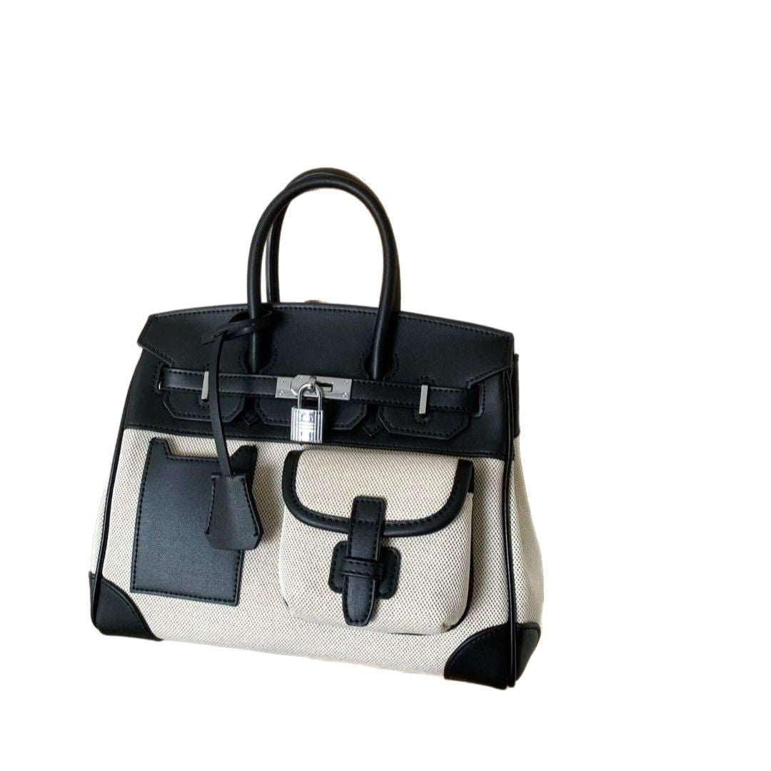 A spring new contrasting color canvas leather pocket platinum bag versatile casual shoulder oblique span women's bag