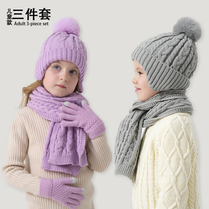 A children's hats, scarves and gloves three-piece set wool inside
