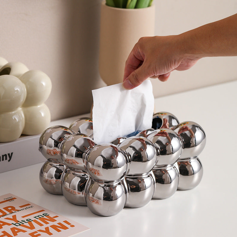 A ceramic tissue box ashtray