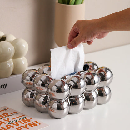 A ceramic tissue box ashtray