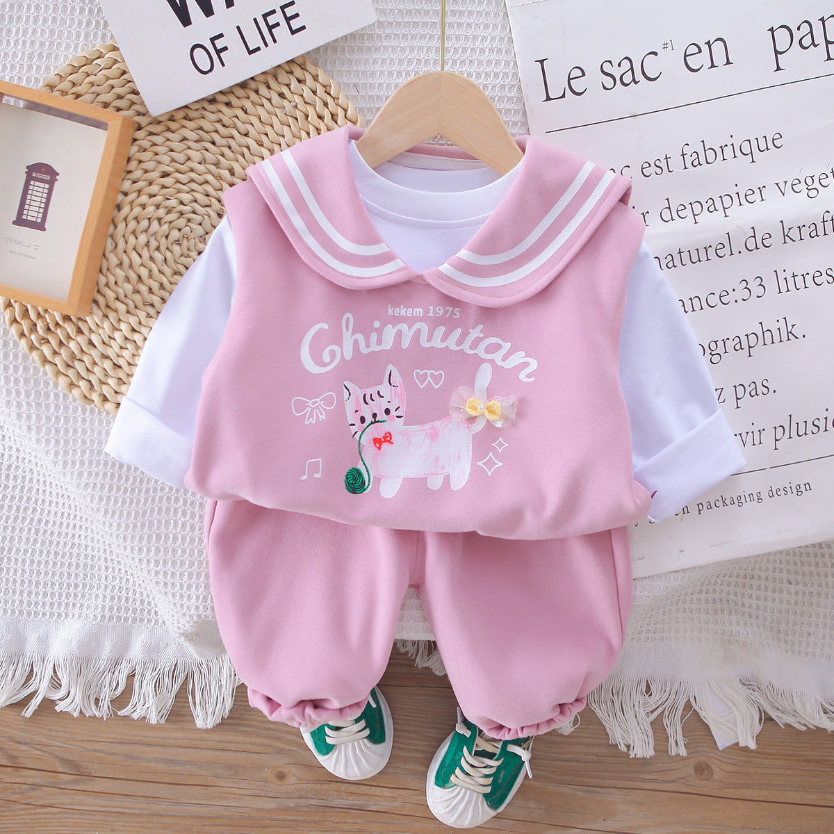 A children's long-sleeved three-piece set
