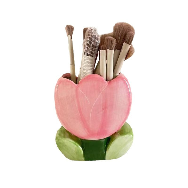 A ceramic pen holder storage ornament