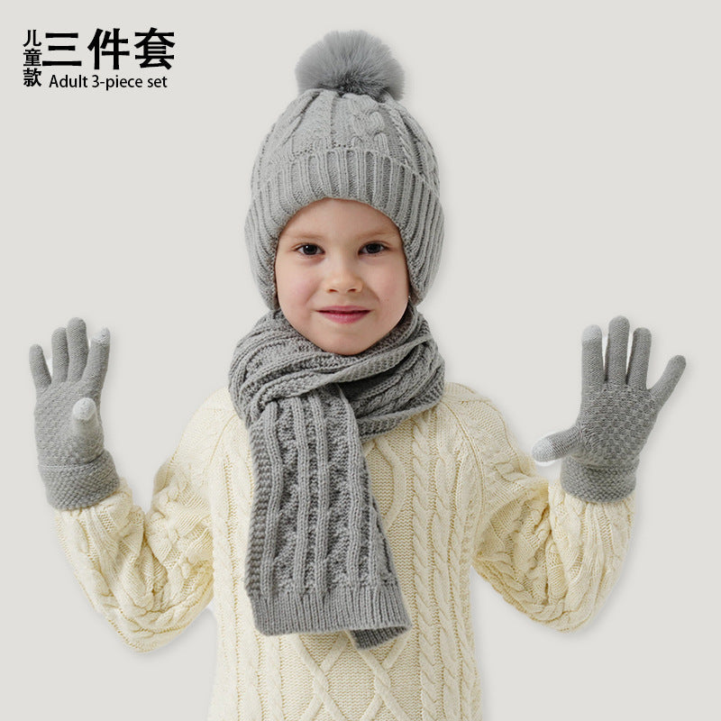A children's hats, scarves and gloves three-piece set wool inside