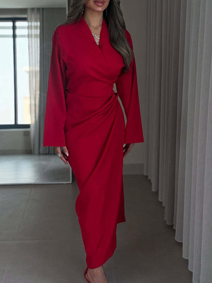 A long-sleeved V-neck dress