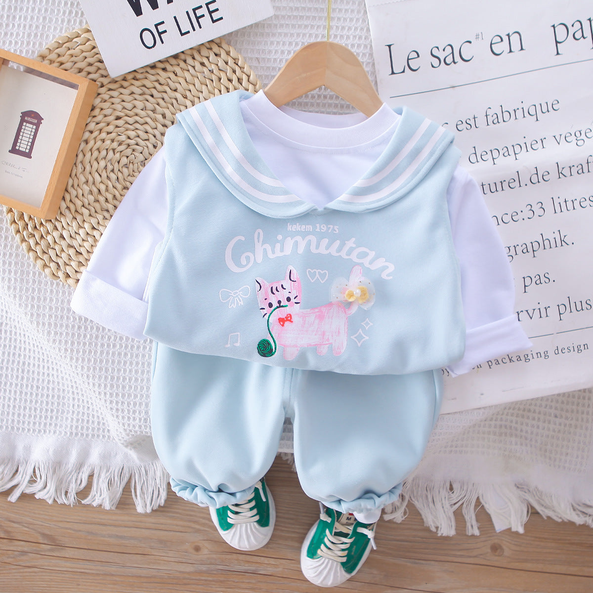 A children's long-sleeved three-piece set
