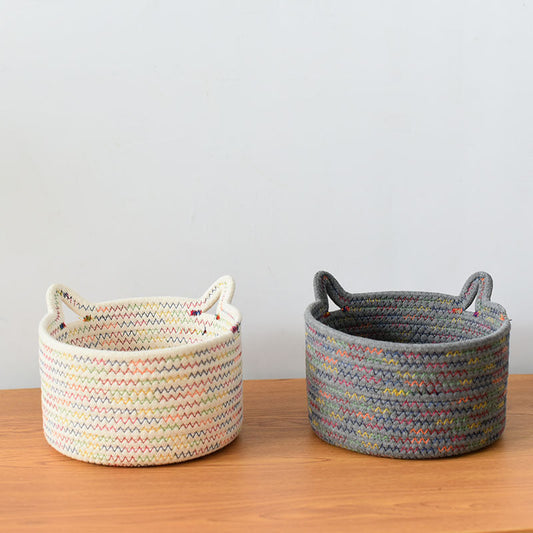 A woven fabric storage basket