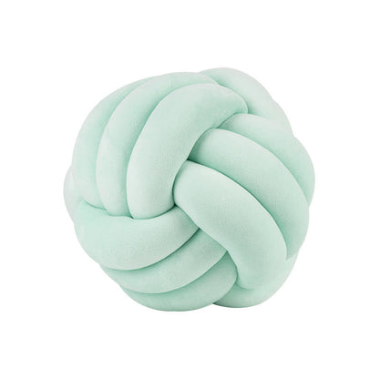 A braided ball pillow