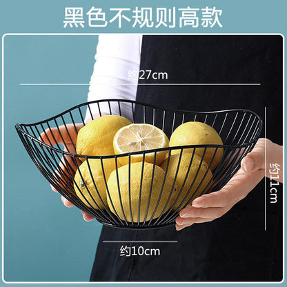 A fruit basket wrought iron storage basket