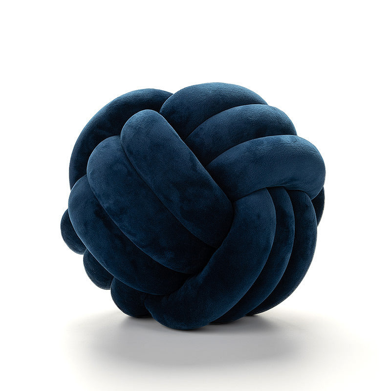 A braided ball pillow