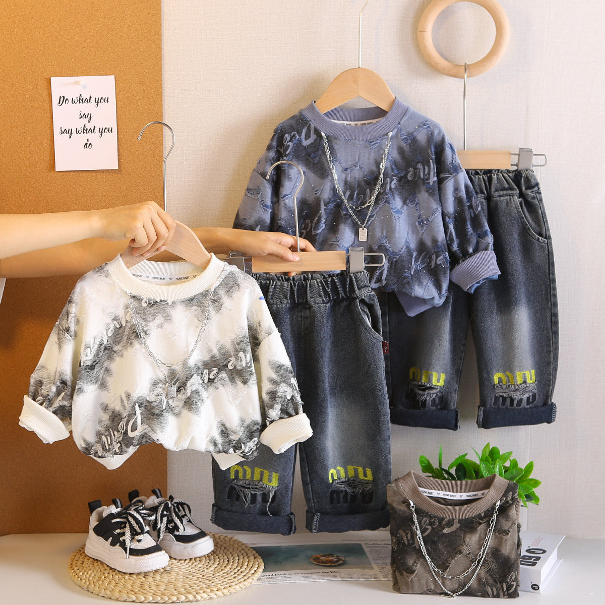 A children's sweater jeans set