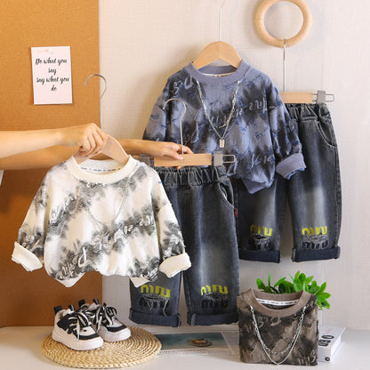 A children's sweater jeans set