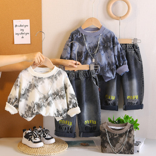 A children's sweater jeans set