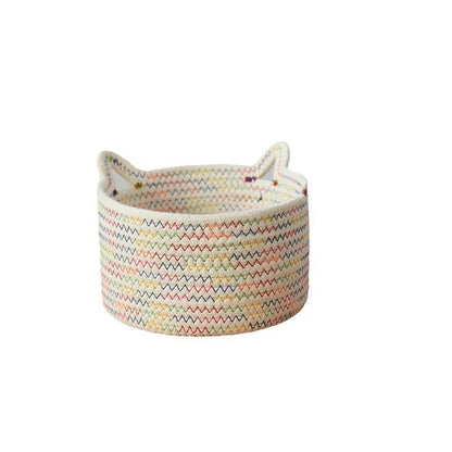 A woven fabric storage basket