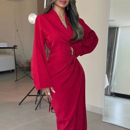 A long-sleeved V-neck dress