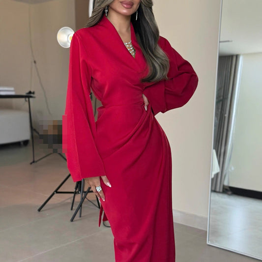 A long-sleeved V-neck dress