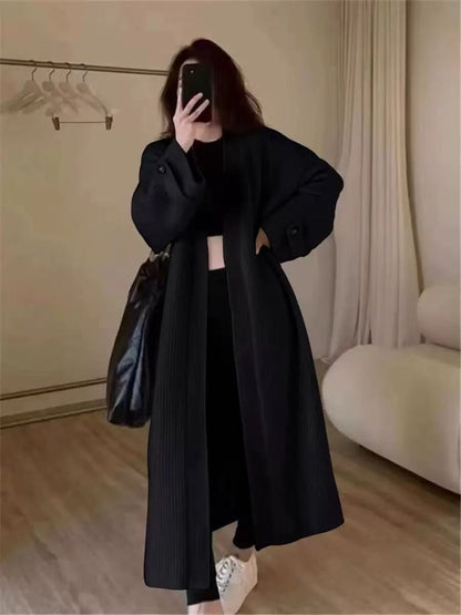 A long sweater knit jacket