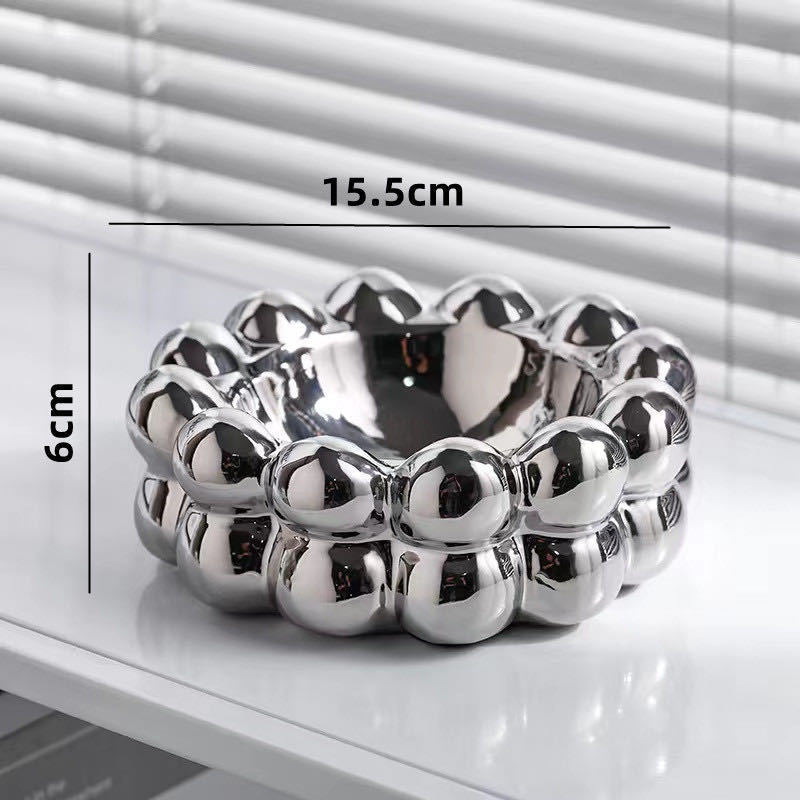 A ceramic tissue box ashtray