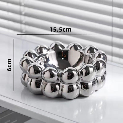 A ceramic tissue box ashtray