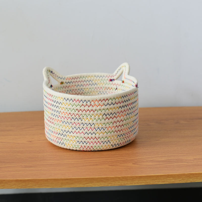 A woven fabric storage basket