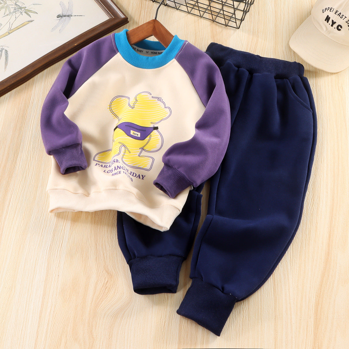 A Children's cartoon sweatshirt and pants set