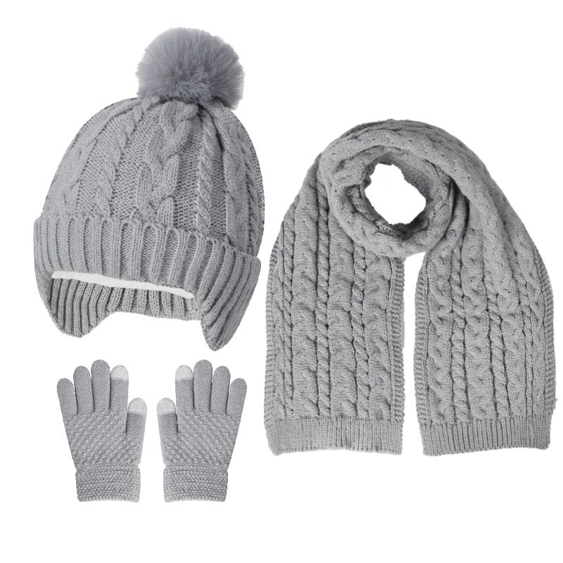 A children's hats, scarves and gloves three-piece set wool inside