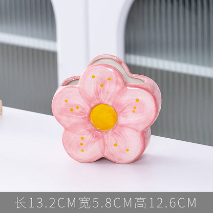 A ceramic pen holder storage ornament