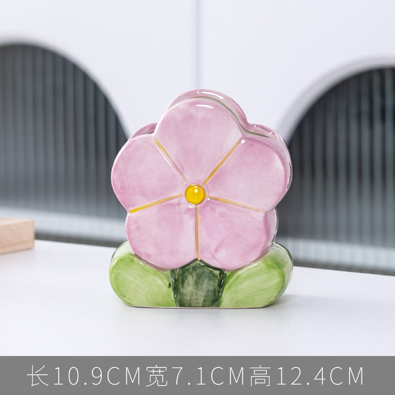A ceramic pen holder storage ornament