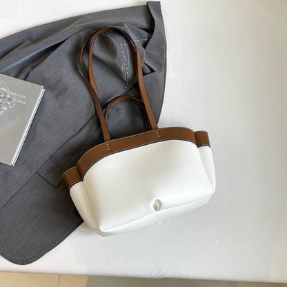 A large capacity shoulder bag