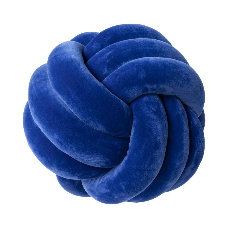 A braided ball pillow