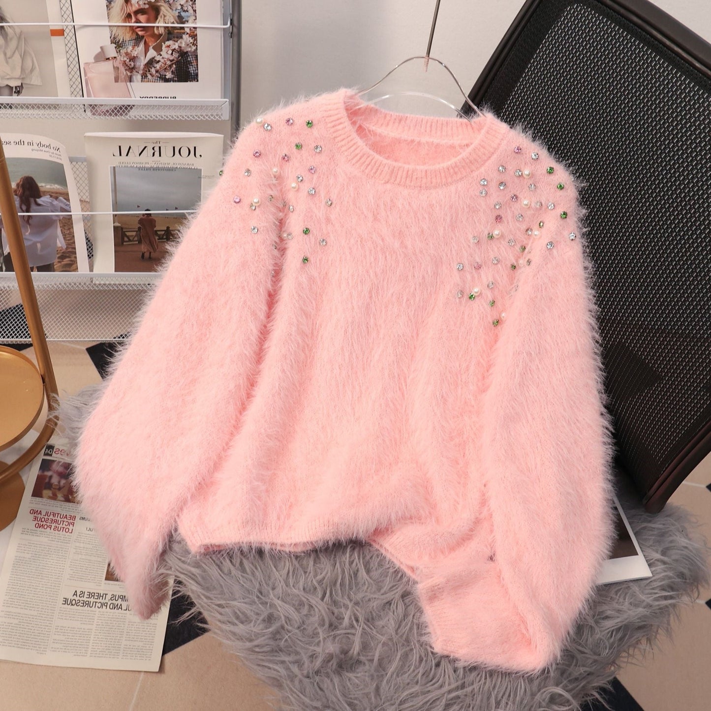 A diamond-encrusted fluffy top sweater