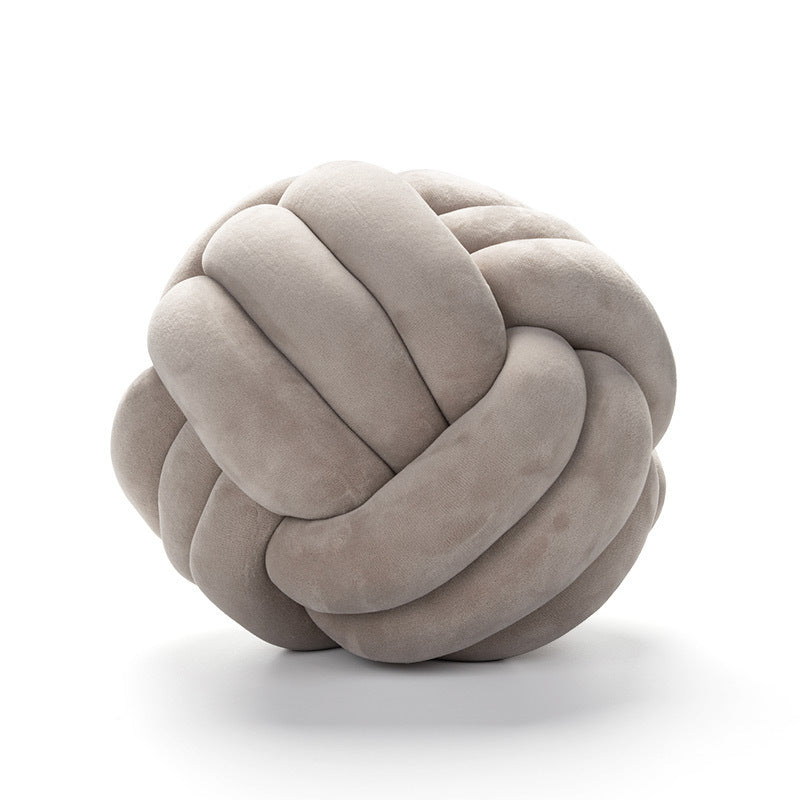 A braided ball pillow
