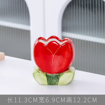 A ceramic pen holder storage ornament