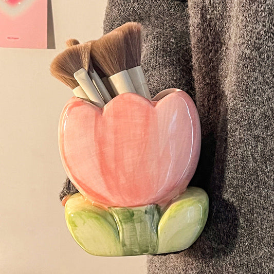 A ceramic pen holder storage ornament