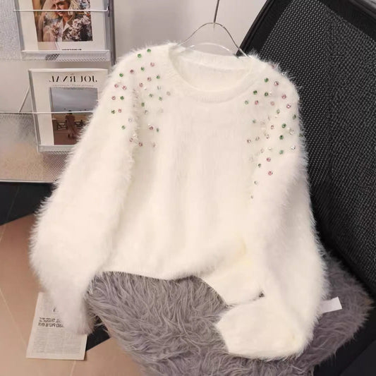 A diamond-encrusted fluffy top sweater
