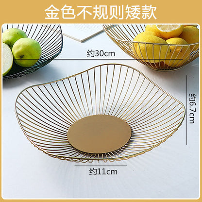 A fruit basket wrought iron storage basket