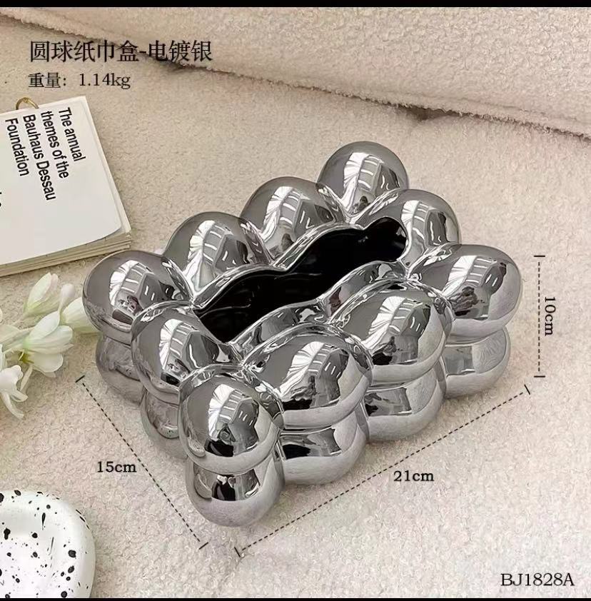 A ceramic tissue box ashtray