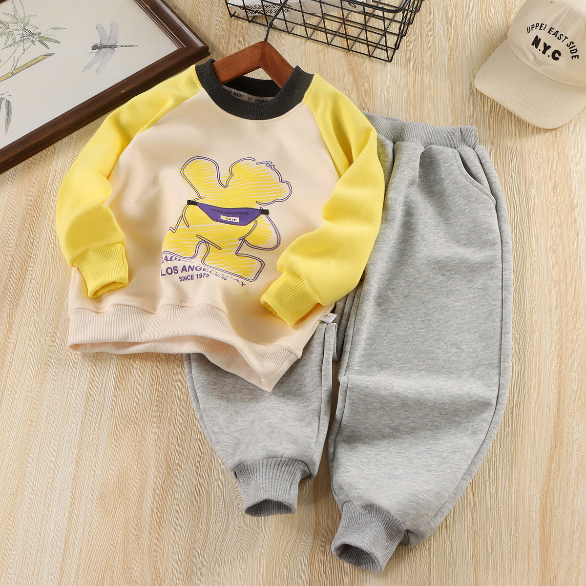 A Children's cartoon sweatshirt and pants set
