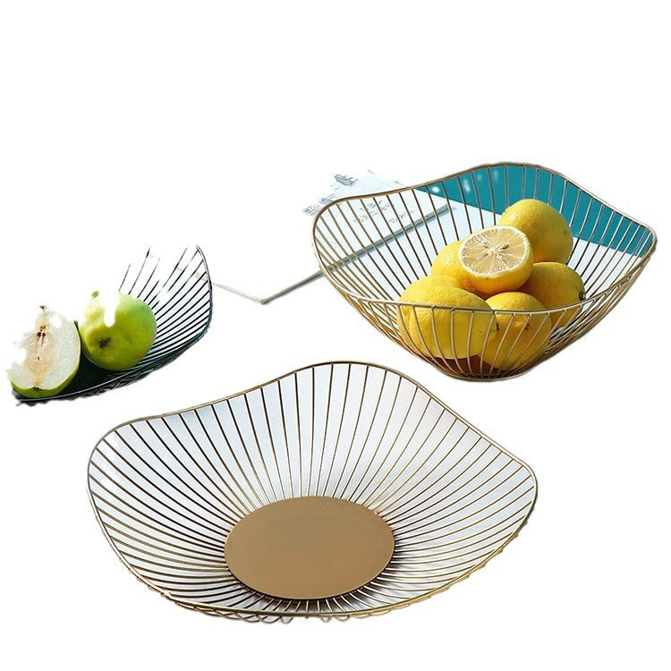 A fruit basket wrought iron storage basket