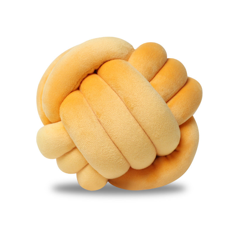 A braided ball pillow