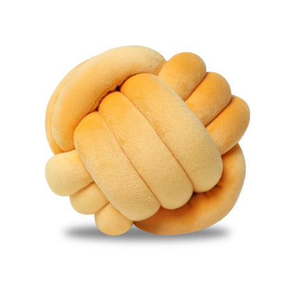 A braided ball pillow