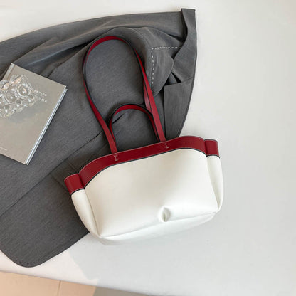 A large capacity shoulder bag