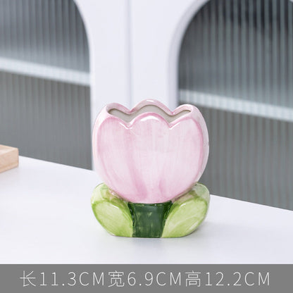 A ceramic pen holder storage ornament