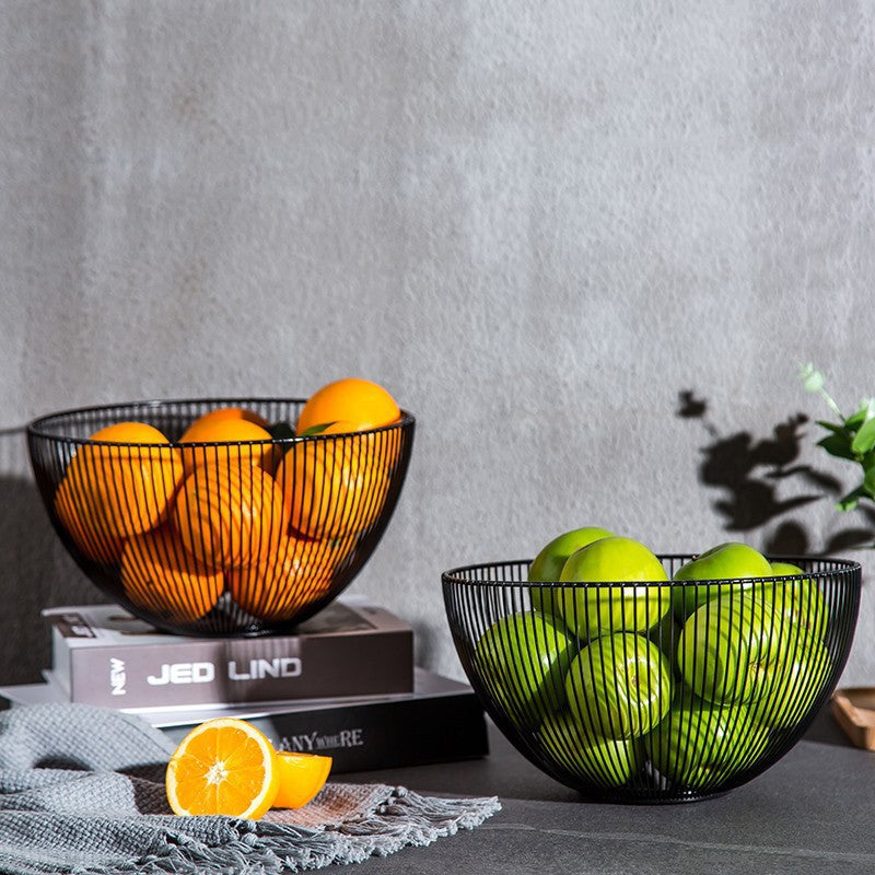 A wrought iron snack pot fruit plate storage