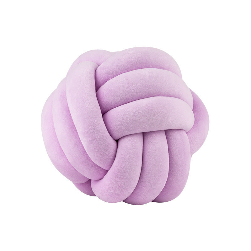 A braided ball pillow