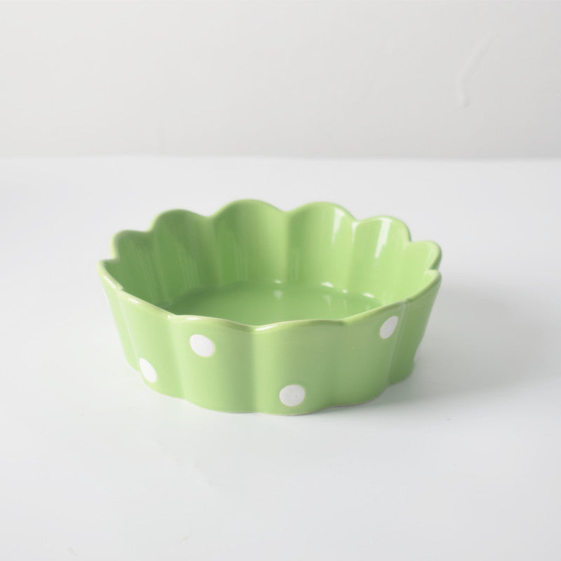 A polka dot ceramic bowl